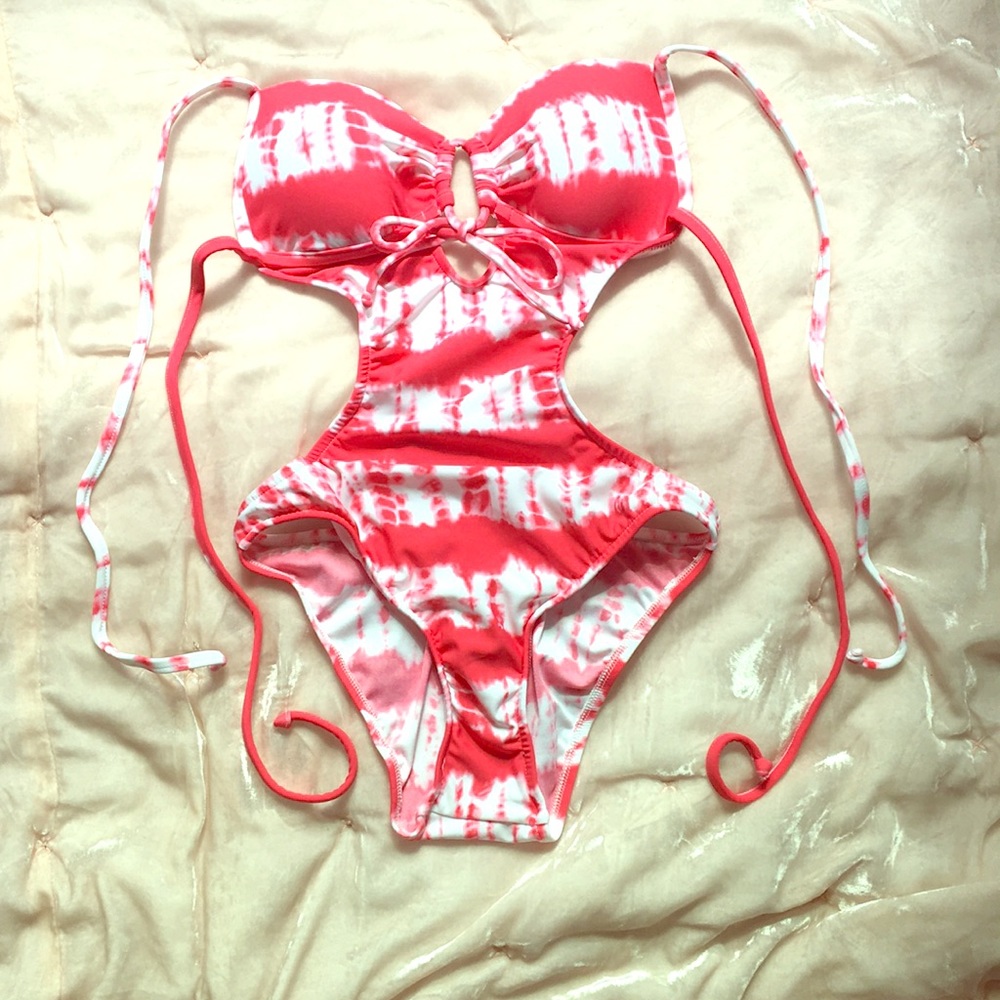 A pink and white swimming suit